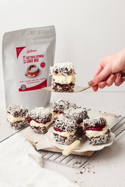 Low Carb keto lamingtons made with Justine's Victoria Sponge Cake mix